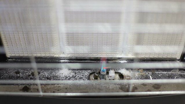 Heating gas convector during operation.