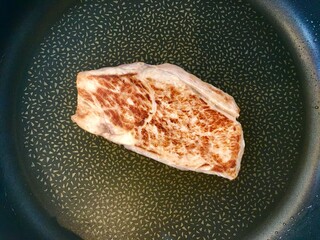 Pork on frying pan