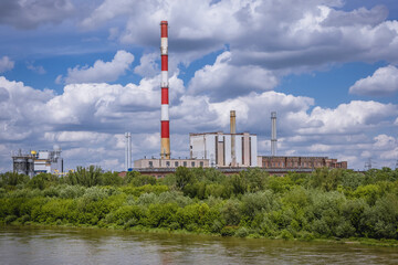 Fototapeta na wymiar Heat power station over River Vistula in Warsaw city, Poland