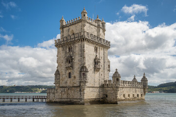 Fototapeta na wymiar Belem Tower at the bank of Tagus River in Lisbon at sunny day, Portugal
