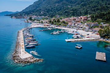 Marina in Benitses village on the Ionian Sea shore in Corfu Island, Greece