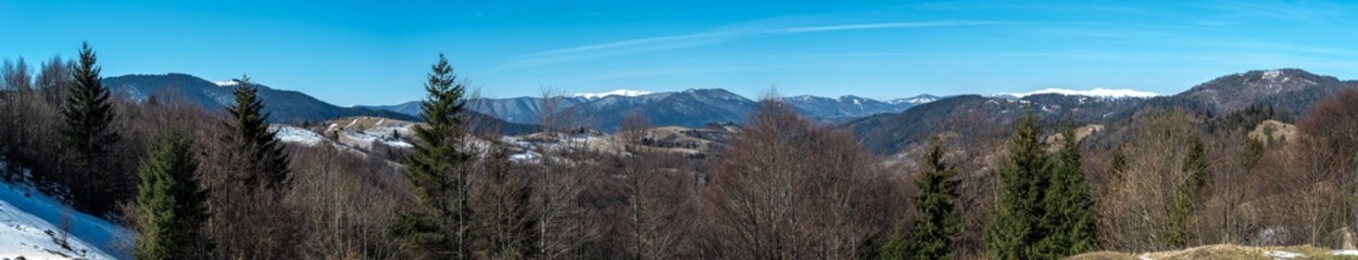 Fototapeta na wymiar Mountains range panorama. Mountains and blue sky