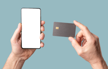 Mobile phone mock-up and bank credit card mockup in male hand isolated on white background