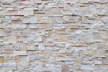 Facade of stone slabs in light colors