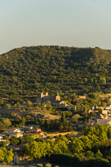 Obraz premium Traditional French village in the middle of the southern countryside at the golden hour.
