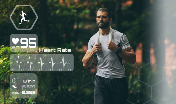 Man running in the park. Healthy runner with smart fit watch. Technology, training, health concept. - Powered by Adobe