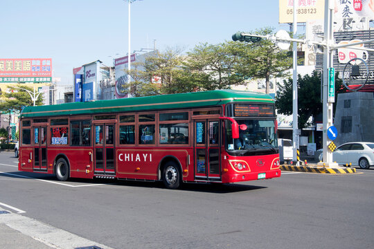 Public bus travels on the street of Chiayi city