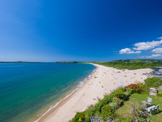 Fototapeta na wymiar White sandy beach on a sunny day (Tenby, Wales, United Kingdom, in summer)