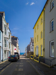 Fototapeta na wymiar Quiet street in seaside town (Tenby, Wales, United Kingdom, in summer)