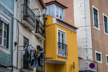 Fototapeta na wymiar Buildings in historic part of Lisbon city, Portugal