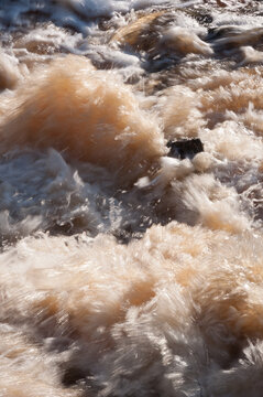 Foaming water in raging rapids