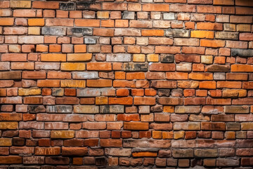 brick background with texture of an old red stone wall.