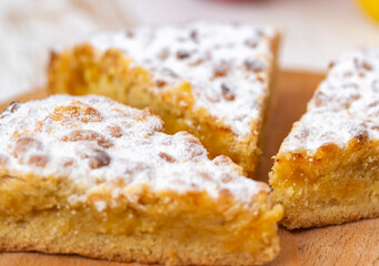 apple pie on wooden desk on white table