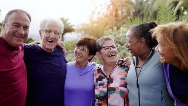 Multiracial sport senior people having fun together after exercise workout outdoor at park city - Joyful elderly friendship community
