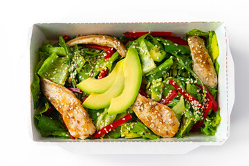 Healthy chicken salad with avocado,in package for take away or food delivery.