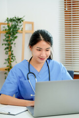 Doctor with tablet in medical office. Visiting Physician online concept