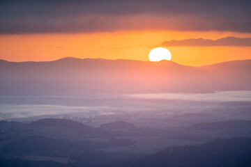 Scenic foggy sunrise in autumn