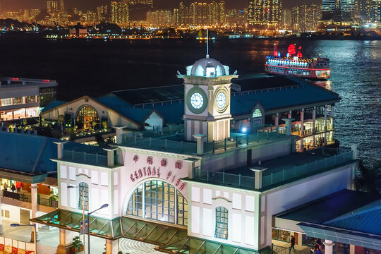 Central Ferry Pier Clocktower marks the access point for transportation to outlying islands and mainland China. Night view of Central Ferry Pier building