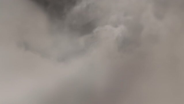 Smoke blowing transition reveal at camera on alpha background
