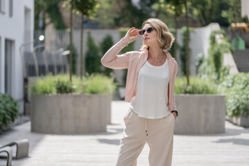 Portrait of Beautiful White Caucasian Adult Woman She is Wearing Active Lifestyle Outdoor Sportwear.