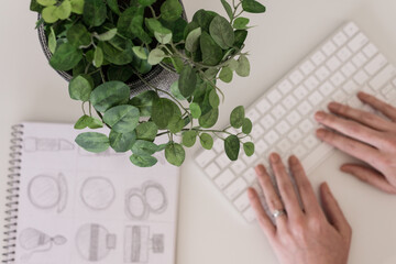 hands on white keyboard