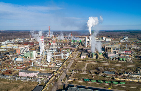 Chemistry Factory in Lithuania, Achema in Jonava City. Clear Blue Sky and Smoke in background. Drone