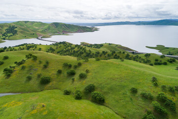 Upper Cottonwood Creek Wildlife Area. Beautiful Nature and Landscape. Green area with Cloudy Sky. Close to San Luis Reservoir. California, USA. Drone