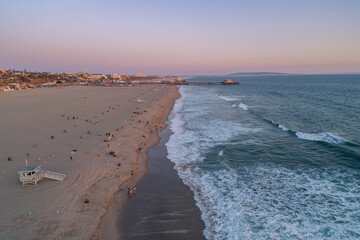 Sunset in Santa Monica, Los Angeles, California. Situated on Santa Monica Bay, it is bordered on...