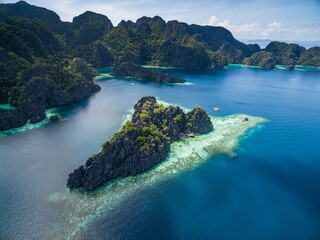 Twin Lagoon in Coron, Palawan, Philippines. Mountain and Sea. Lonely Boat. Tour A.