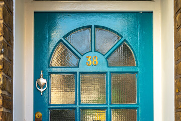 House number 38 in blue