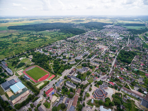Radviliskis City in Lithuania. Sport Stadium and Cityscape, Skyline in Background. Aerial, Architecture.