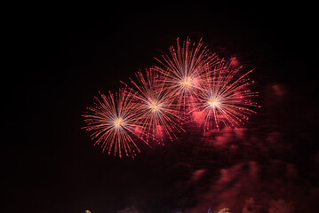 Colorful firework with bokeh background. New Year celebration, Abstract holiday background. Fireworks at Night. Abstract background for celebration