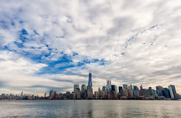 Fototapeta premium Hudson River and Manhattan Cityscape with One World Trade Center in Background. NYC, USA