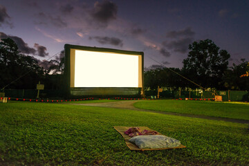 outdoor night cinema with blank screen for copy