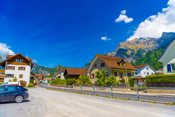 Fototapeta na wymiar Road and houses near the mountains in Vaduz, Oberland Liechtenstein