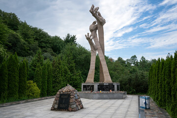 Monument to the victims of the Holocaust - memorial to the victims of the "Death March" in the village of Yantarny, Svetlogorsk, Kaliningrad region, Russia - Powered by Adobe