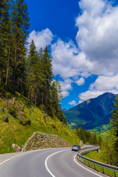 Road among Alps mountains, Klosters-Serneus, Davos, Graubuenden Switzerland