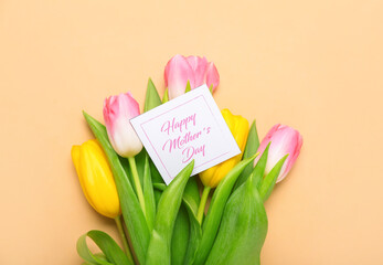 Card with text HAPPY MOTHER'S DAY and beautiful tulip flowers on color background