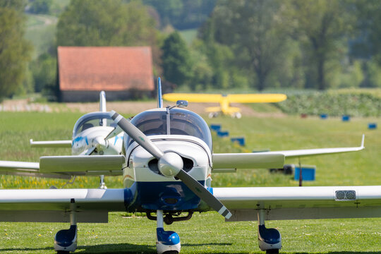 Robin DR400 airplane on the grass parking in Lommis in Switzerland 11.5.2022