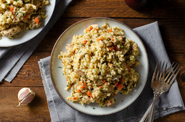 Rice with Mushrooms, Chicken, and Vegetables, Risotto, Comfort Food, Healthy Meal on Rustic Background