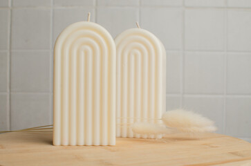 a candle made of soy wax in the form of an arch. beautiful home decor