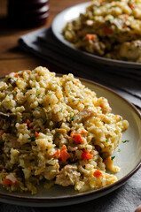 Rice with Mushrooms, Chicken, and Vegetables, Risotto, Comfort Food, Healthy Meal on Rustic Background