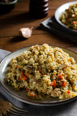 Rice with Mushrooms, Chicken, and Vegetables, Risotto, Comfort Food, Healthy Meal on Rustic Background
