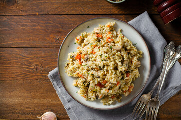 Rice with Mushrooms, Chicken, and Vegetables, Risotto, Comfort Food, Healthy Meal on Rustic Background