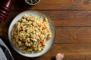 Rice with Mushrooms, Chicken, and Vegetables, Risotto, Comfort Food, Healthy Meal on Rustic Background