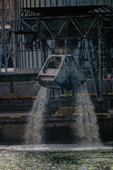 Bucket during dredging in the port of Odessa