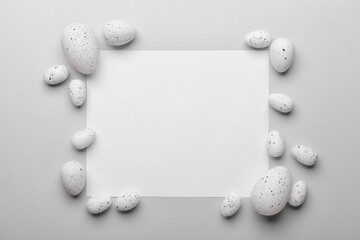 Blank greeting card with Easter eggs on white background