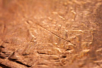Extreme closeup of crumpled brass foil texture