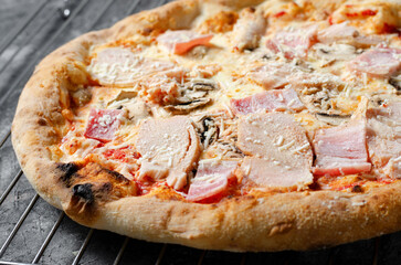 Frozen Chicken, Bacon, Mushroom Pizza on Dark Background, Stone Baked Pizza Ready to Bake