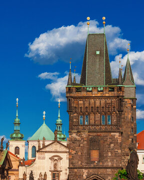 Prague old historical center beautiful architectures with baroque onion domes and medieval Old Town Bridge Tower